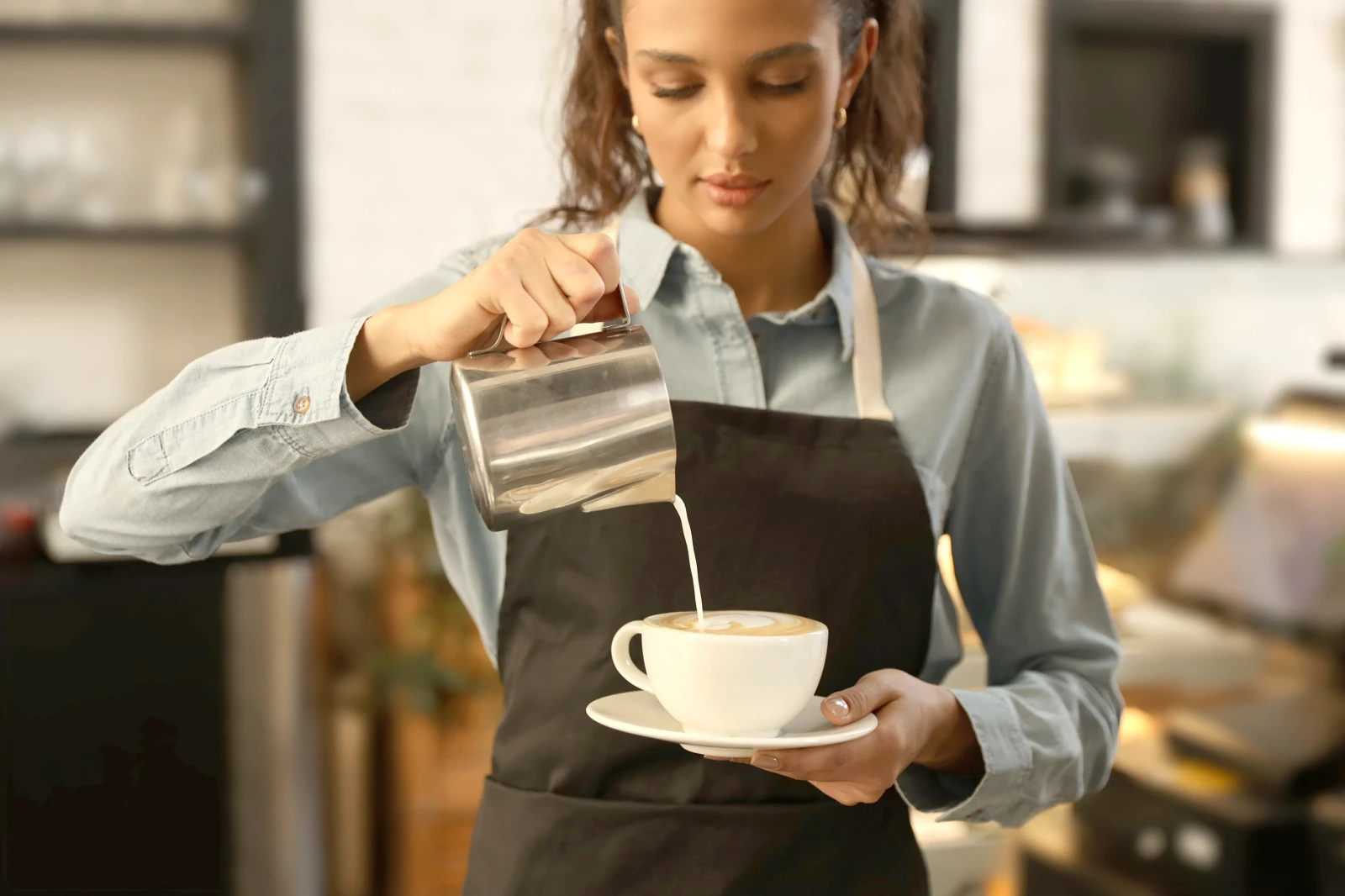 Female barista in cafe
